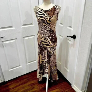 Umgee mixed animal print, maxi dress.  Sleeveless w high cut front, cut out back